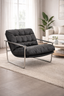 Side angle of Archer tufted chair showing sleek chrome frame and low profile modern silhouette.