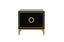 Black Balmain bedside table with gold trim featuring two drawers and circular gold handle design.