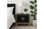 Black Balmain bedside table with gold trim styled beside bed with lamp and indoor plant.