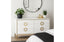 Balmain white dresser with gold trim styled with plants, décor tray, and mirror in a modern bedroom.