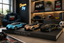 Three miniature toy sports cars displayed on a black book-shaped stand in a styled room setting. The cars are light blue, metallic gold, and black with gold accents.