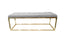 Holly Ottoman in Light Grey velvet with gold frame.