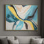 Abstract painting with blue, yellow, and black colors on a gray wall above a gray sofa.