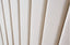 Detailed view of Allure Velvet Bed Beige headboard with vertical tufting and soft velvet texture.
