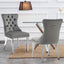 Elegant Alsea dark grey velvet dining chairs with silver legs styled in a dining space
