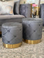 Grey Amy Storage Ottomans with gold base styled in living room interior setting