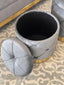Grey Amy Storage Ottoman with lid open showing hidden storage and gold base