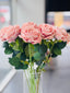 Close-up of Soft Pink Artificial 3 Stem Roses in a clear glass vase – ultra-realistic 60cm faux roses with lush green leaves for elegant floral décor