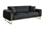 Bold black velvet three-seater sofa with statement gold trims and cushions