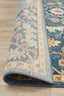 Folded corner of Babylon Navy Rug highlighting intricate weave