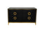 Balmain black dresser with gold trim featuring six drawers and circular handles in modern design.