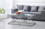Beverly coffee table in silver polished frame with clear glass top, contemporary sophistication.