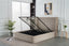Light grey storage bed with lifted slats and hidden compartment