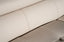 Close-up of Brighton cream leather lounge showing fine stitching detail and smooth padded upholstery texture.