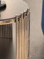 Close-up of Chelsea side table in black marble with polished silver frame