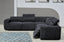 Charcoal Cleo boucle modular lounge styled with rug, electric recliner open and headrest lifted