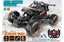 RC monster truck climbing terrain with remote control and off-road features.