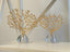 Gold Crystal Tree Table Décor set with clear crystal bases displayed on a modern white surface, showcasing elegant branch design
