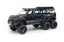 Side view of black RAM TRX 6x6 diecast truck with six-wheel design.