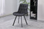 Black Emerson dining chair styled in modern room adding sleek contrast and contemporary character