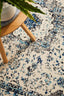 Corner detail of the Evoke 21 White Rug highlighting its fine border and pattern definition.