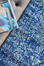 Close-up of the intricate Persian-inspired pattern on the Evoke 253 Navy Rug.