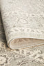 Folded edge view highlighting thick rug pile, soft texture, and durable polypropylene weaving.