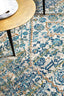 Detailed view of Evoke 263 Silver Rug pattern with blue, gold, and silver tones