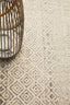Detailed view of Evoke 265 Grey Rug with lantern décor, showcasing intricate diamond design.