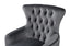 Detailed tufted backrest of GRAND dark grey velvet wing chair in luxury finish