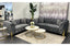 GRAND dark grey velvet tufted sofa set with 3-seater and 2-seater featuring gold steel legs in a luxury showroom display