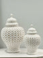 Elegant white ceramic Classic Hampton Urns in large and small sizes with pierced latticework, ideal for refined home styling.
