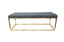 Holly Ottoman in Light Grey velvet with gold frame.