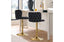 Lara black velvet tufted swivel bar stools with polished gold base in luxury kitchen