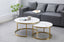 Layla nesting coffee table large set with polished gold frame and marble tops in modern setting.