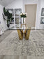 Lenox Dining Table gold frame with clear tempered glass top styled in elegant setting.
