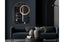 Gold small arch mirror 100cm styled above sofa with dark modern décor