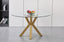 Miles round dining table with gold stainless frame and clear tempered glass top, elegant design.