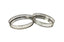Stylish silver round tray set with mirrored base and intricate lattice detailing.