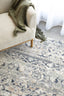  showcasing detailed blue, navy, and beige motifs with a soft chenille-polypropylene texture.