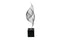Medium silver Ribbon Table Décor on a black base, showcasing a contemporary sculptural twist ideal for console or shelf styling.