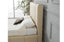 Side view of Riley beige PU leather bed showcasing vertical panelled headboard and soft upholstery.