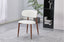 White Riley dining chair styled in bright space delivering fresh modern elegance and comfort