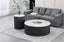 Black marble round coffee and side tables styled in lounge adding sleek modern sophistication