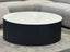 Ripple black coffee table with white marble top styled in grey lounge room