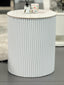White Ripple round side table with ribbed body styled in living room