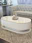 White marble Ripple coffee table styled in elegant lounge creating bright airy modern atmosphere
