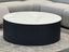 Ripple black coffee table with white marble top styled in grey lounge room