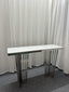 Serena console table with polished silver frame and white marble top in studio setting.