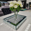 Styled square Vogue Diamond Tray with mirrored base and diamond embellishments, beautifully displayed with candle and floral accents.